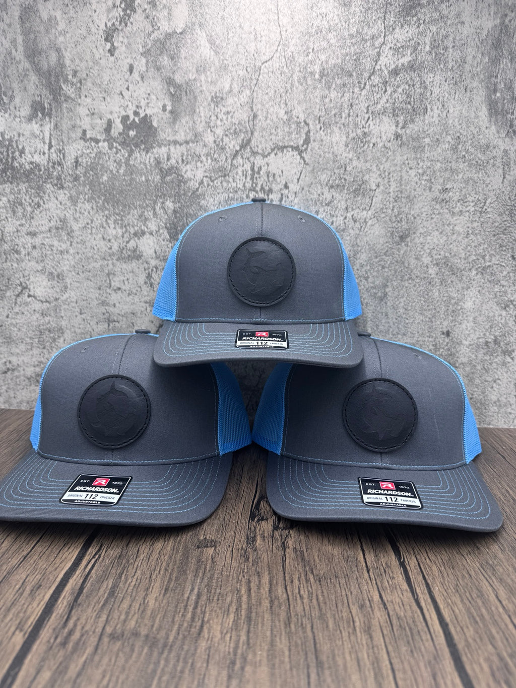 Three charcoal and blue Hammerhead Shark leather patch hats