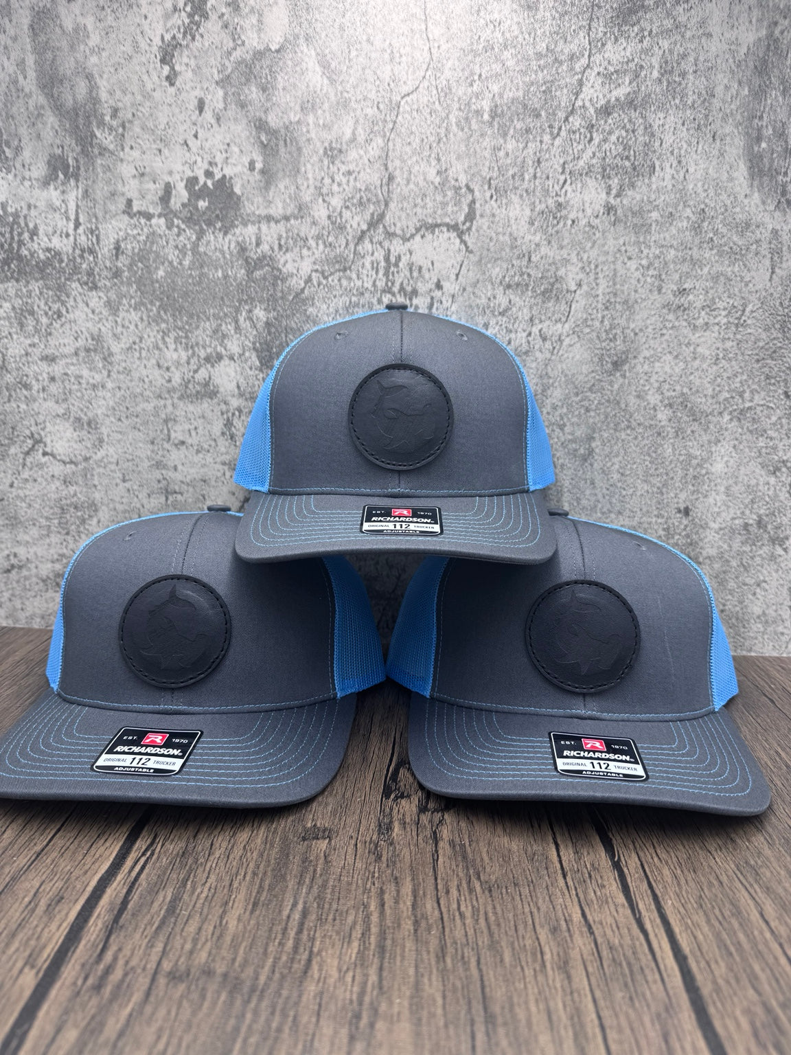 Three charcoal and blue Hammerhead Shark leather patch hats